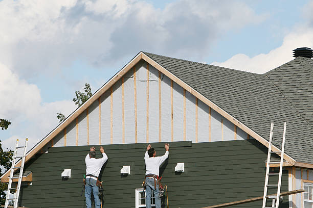 Professional Siding Replacement technician working in Pisgah Forest, NC